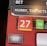 A digital display screen showing a casino betting interface, with text prompting to hurry bets and a highlighted number 27 in red. There are options for betting amounts and a 'share bets' button.